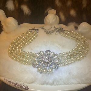 Charming Charlie, four strand flux pearls with a flower design choker